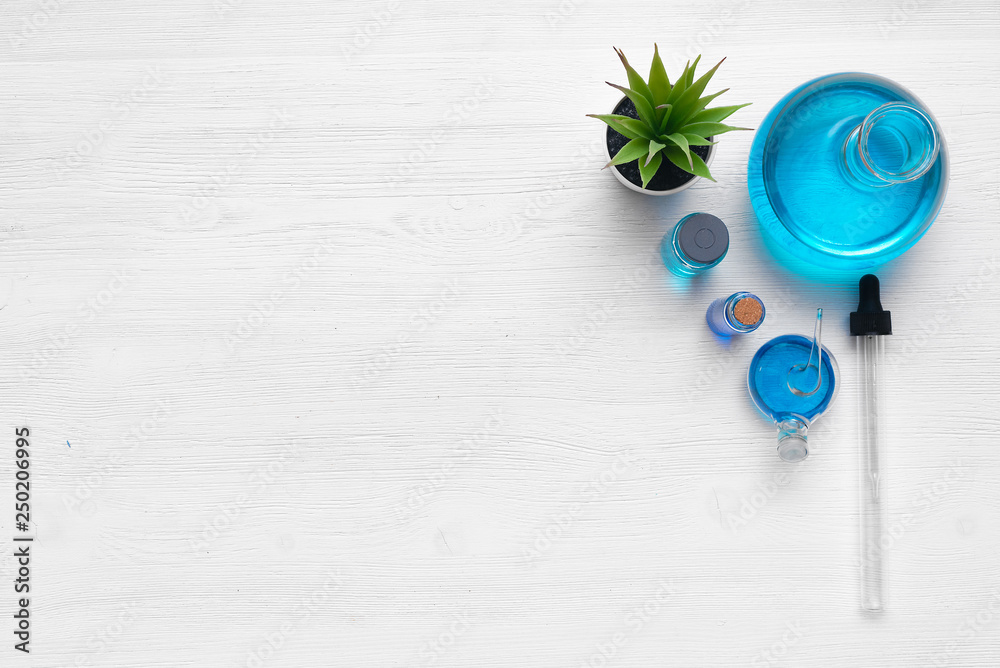 Pharmacy, medicine or chemistry background. Laboratory table with a chemical reagents background with copy space. Flat lay. Pharmacy, medicine or chemistry background. Laboratory table with a chemical reagents background with copy space. Flat lay.