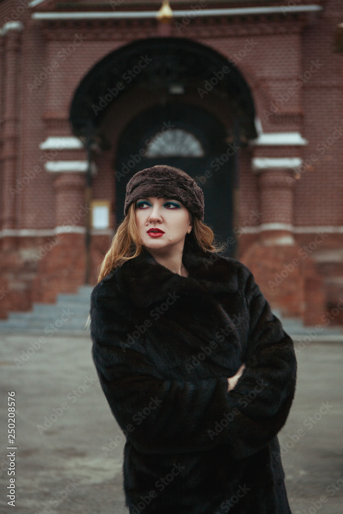 Fototapeta premium Lady is posing wearing Russian style