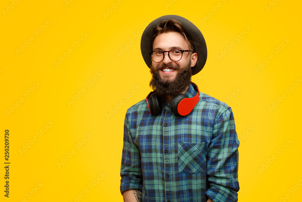 Fototapeta premium Happy hipster guy in headphones
