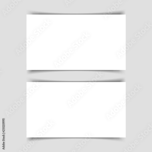 Mok-up of two horizontal business cards with shadow on a gray background. Template for the presentation of business cards. Vector illustration.