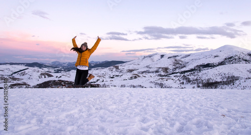 Beautiful and smiling girl on mountain