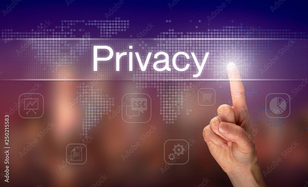 A hand selecting a Privacy business concept on a clear screen with a colorful blurred background.