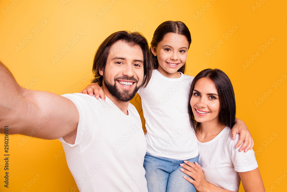 Obraz premium Self-portrait of nice cute lovely attractive charming cheerful cheery people mommy daddy pre-teen girl having fun day daydream isolated over shine vivid pastel yellow background