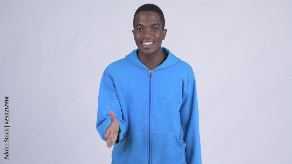Young happy African man giving handshake Young happy African man giving handshake