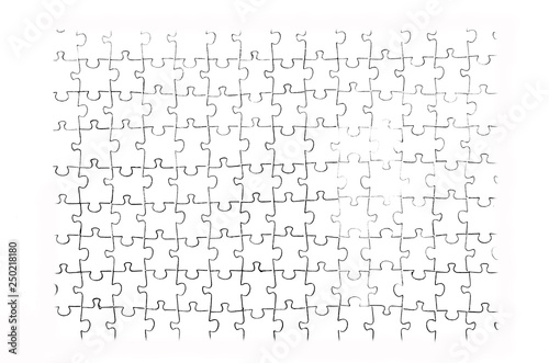 Assembled puzzle on light background.