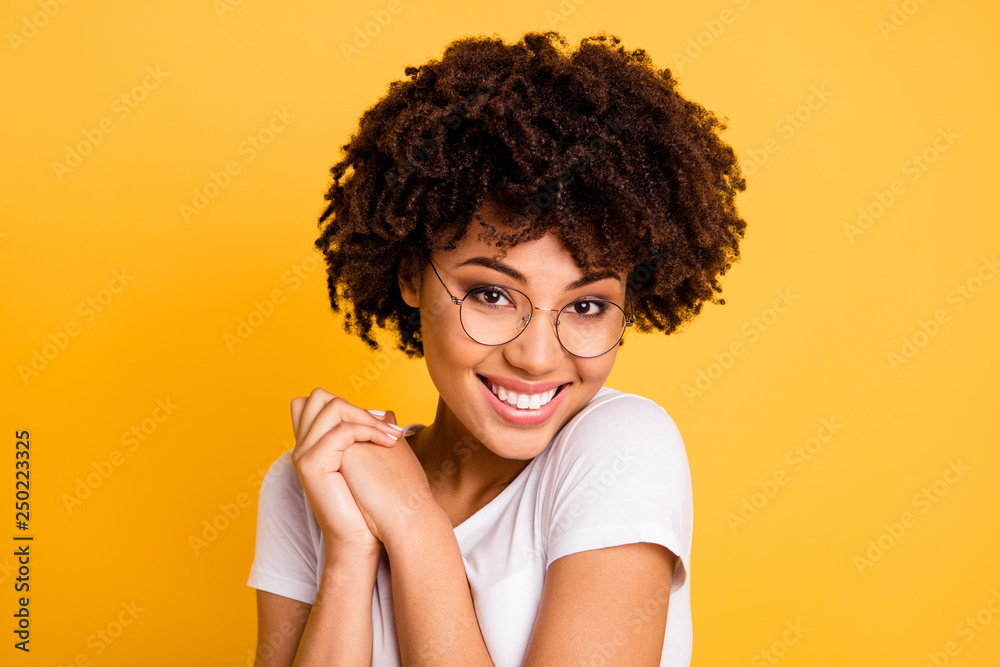 Close-up portrait of her she nice cute charming attractive beautiful cheerful pleased wavy-haired lady eyeglasses eyewear holding hands isolated over bright vivid shine background - obrazy, fototapety, plakaty 