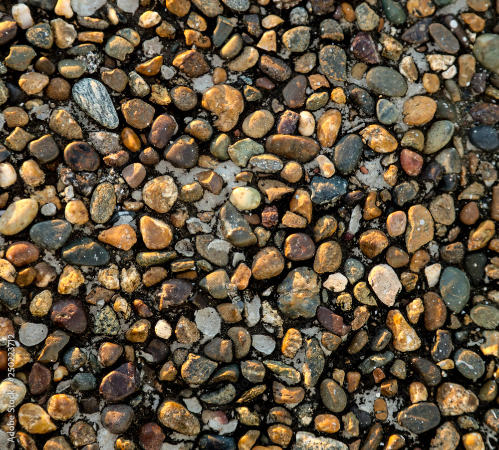 Stone pebbles on the seashore as an abstract background Stone pebbles on the seashore as an abstract background