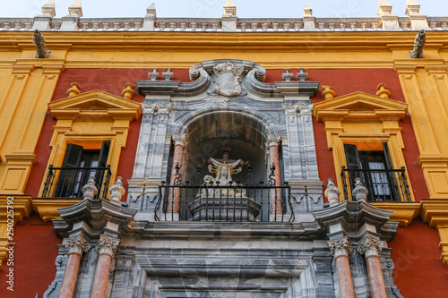facade of a red decorated building