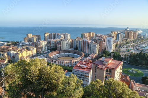 Mediterranean sea with skyscrapers and a bullring