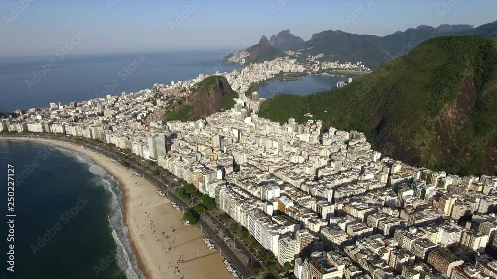 Beautiful Tropical Beach Landscape, Mountains, Luxury Buildings in Copacabana Beach, Rio de Janeiro, Brazil South America. Beautiful Tropical Beach Landscape, Mountains, Luxury Buildings in Copacabana Beach, Rio de Janeiro, Brazil South America.