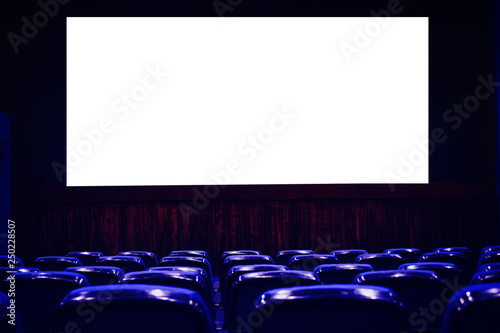 Photography Empty cinema auditorium with empty white screen