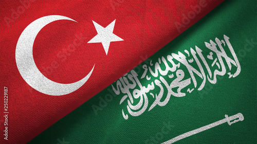 Foto Turkey and Saudi Arabia flags textile cloth, fabric texture