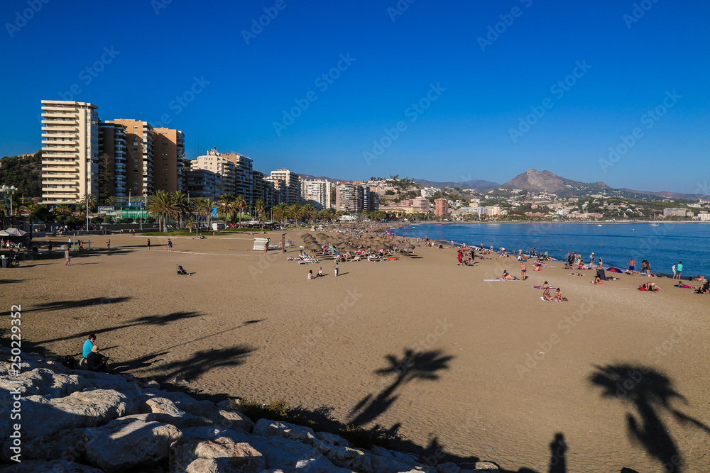 beach in spain with many tourists