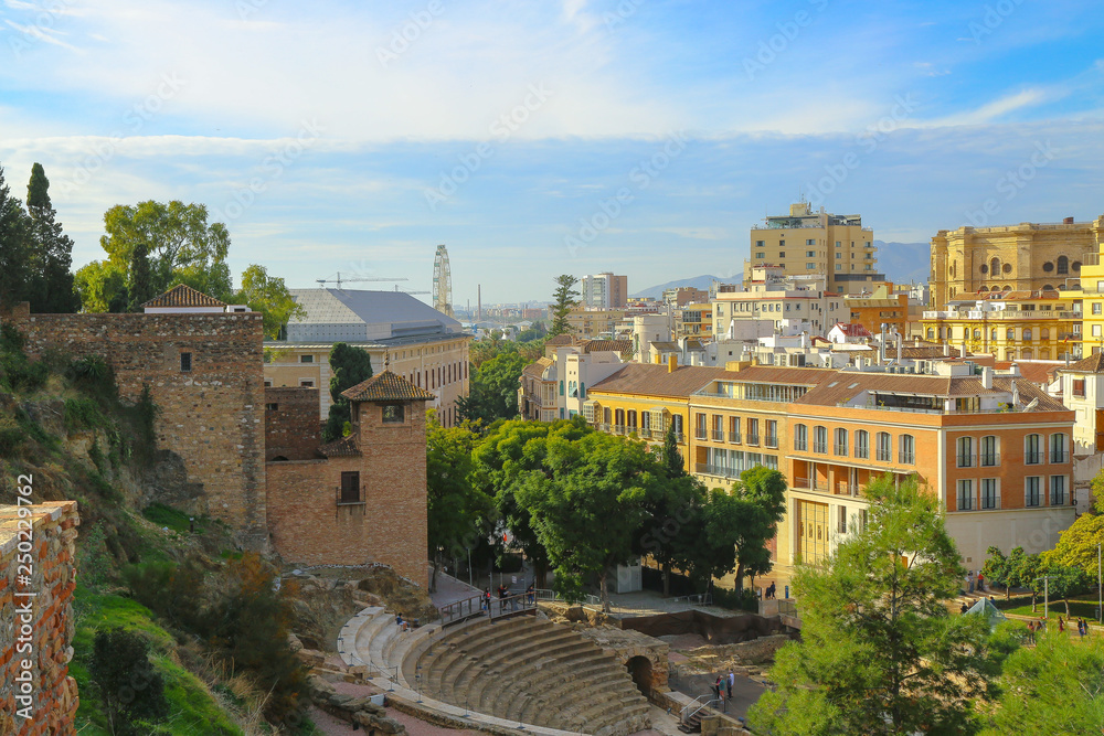 Amphitheatre and alcazaba of malaga spain with the mediterranean sea in the background