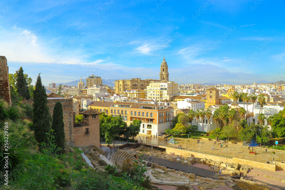 view of the lower part of the alcazaba and the cathedral from the amphitheatre of malaga