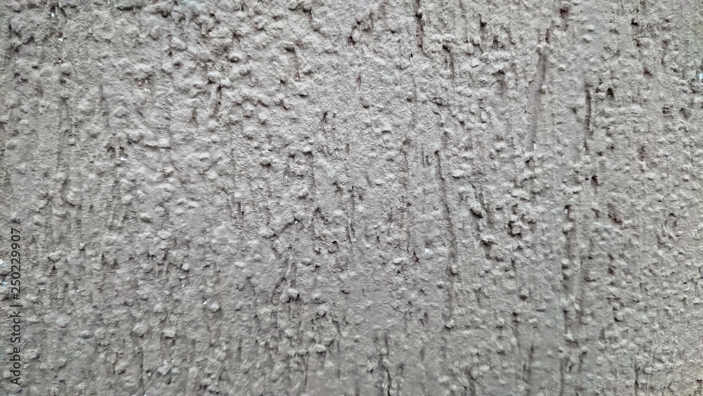 The background of a gray wall. Soft focus.