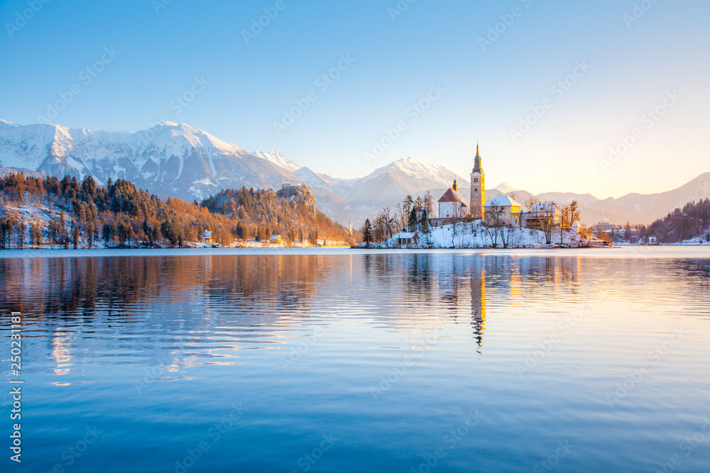 Lake Bled with Bled Island and Castle at sunrise in winter, Slovenia