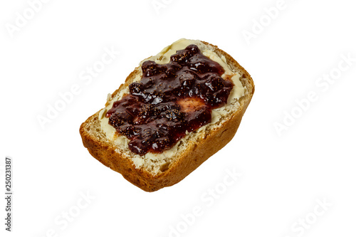 slice of white bread with butter and strawberry jam isolated on white background