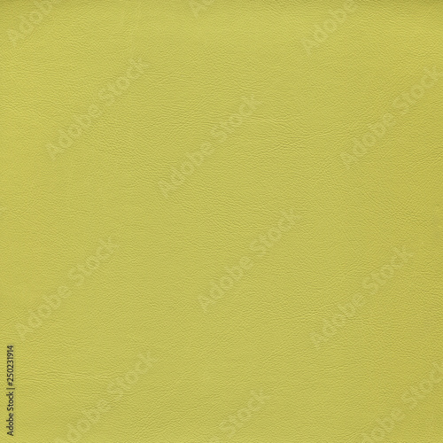 Yellow, gentle, light leather background. Vintage fashion background for designers and composing collages. Luxury textured genuine leather of high quality.