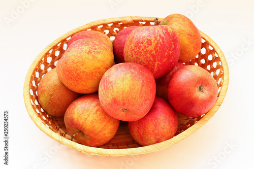 Grape Fuji apples on a white backgroundFuji variety apples photo