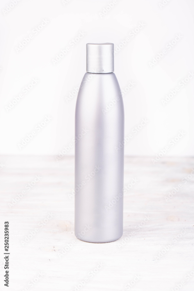 A light pink opaque bottle on a white background