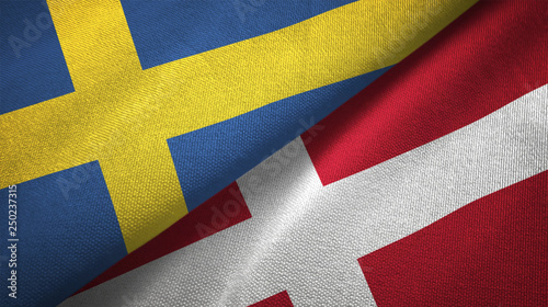 Sweden and Denmark two flags textile cloth, fabric texture photo