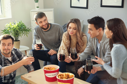 Group of friends eating nug...