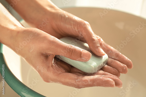 Wet Hands Holding Bar Soap ...