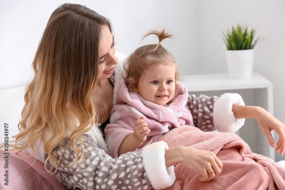 Young woman with her cute little daughter at home Young woman with her cute little daughter at home