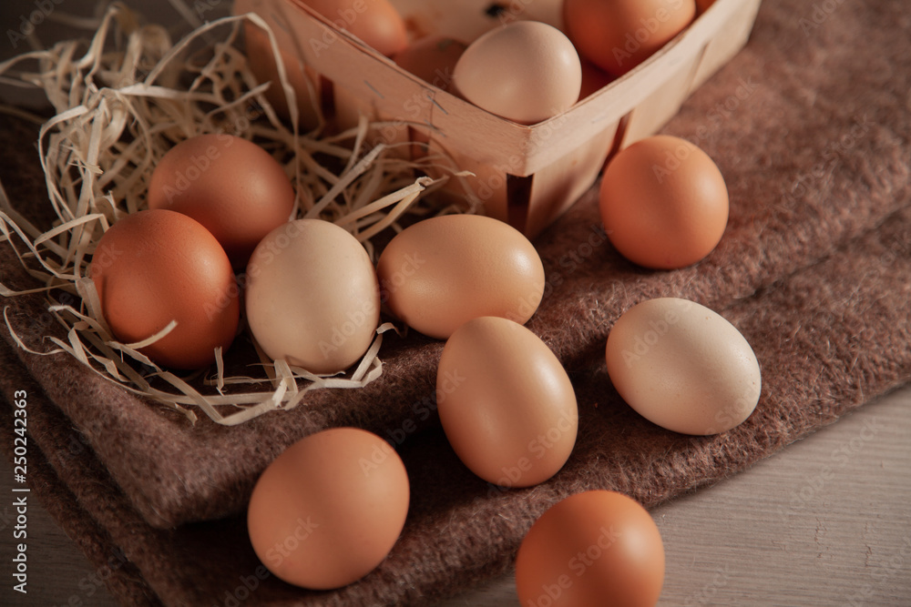 Raw chicken eggs scattered on the table. Raw chicken eggs scattered on the table.