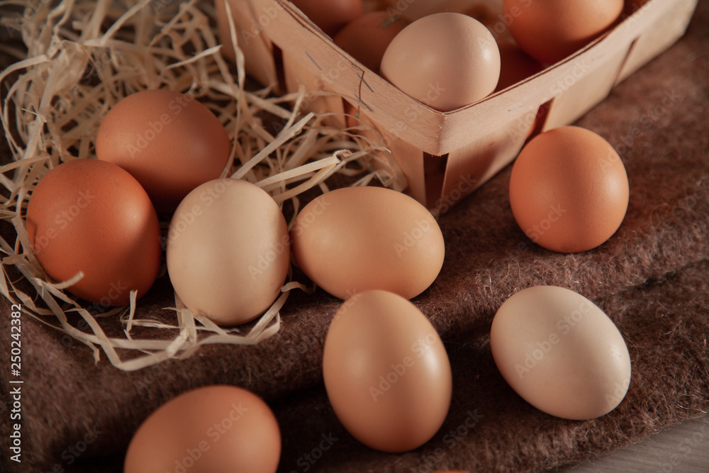 Raw chicken eggs scattered on the table. Raw chicken eggs scattered on the table.