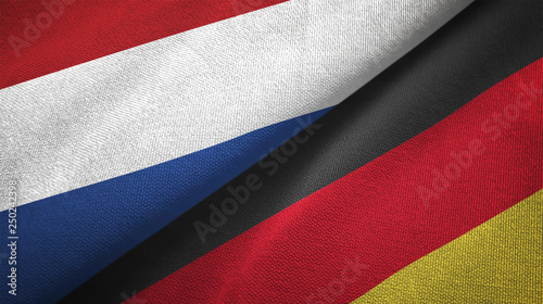 Netherlands and Germany two flags textile cloth, fabric texture