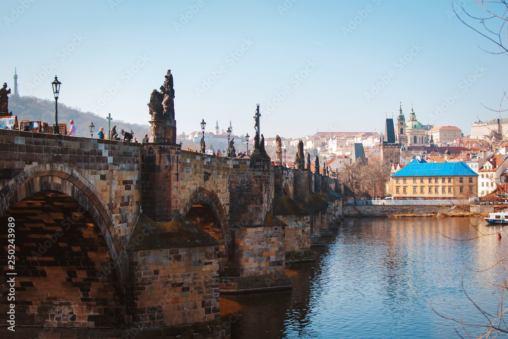 Beautiful view of Charles bridge in Prague on sunny day. Popular tourist attraction. Czech Republic