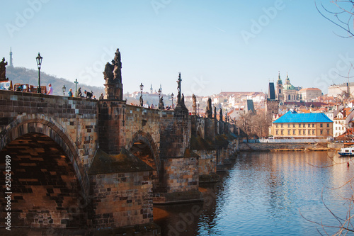 Beautiful view of Charles bridge in Prague on sunny day. Popular tourist attraction. Czech Republic