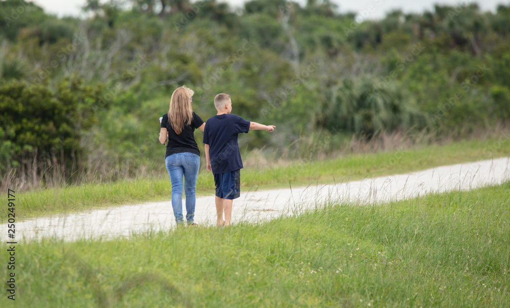 unknown mother and son have spotted something on their hike unknown mother and son have spotted something on their hike