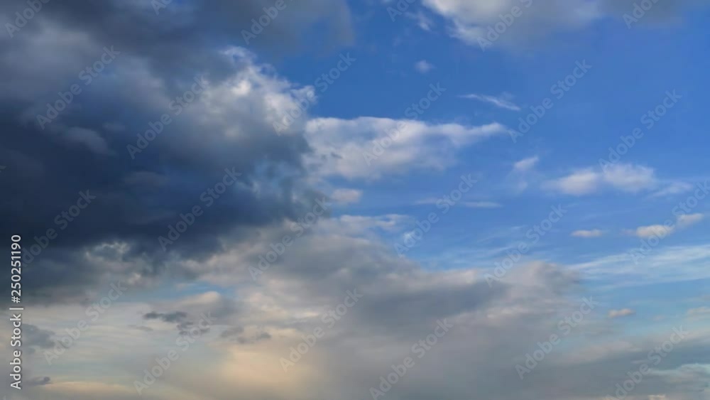 Dark storm-cloud cover blue sky with white clouds at sunny day Dark storm-cloud cover blue sky with white clouds at sunny day