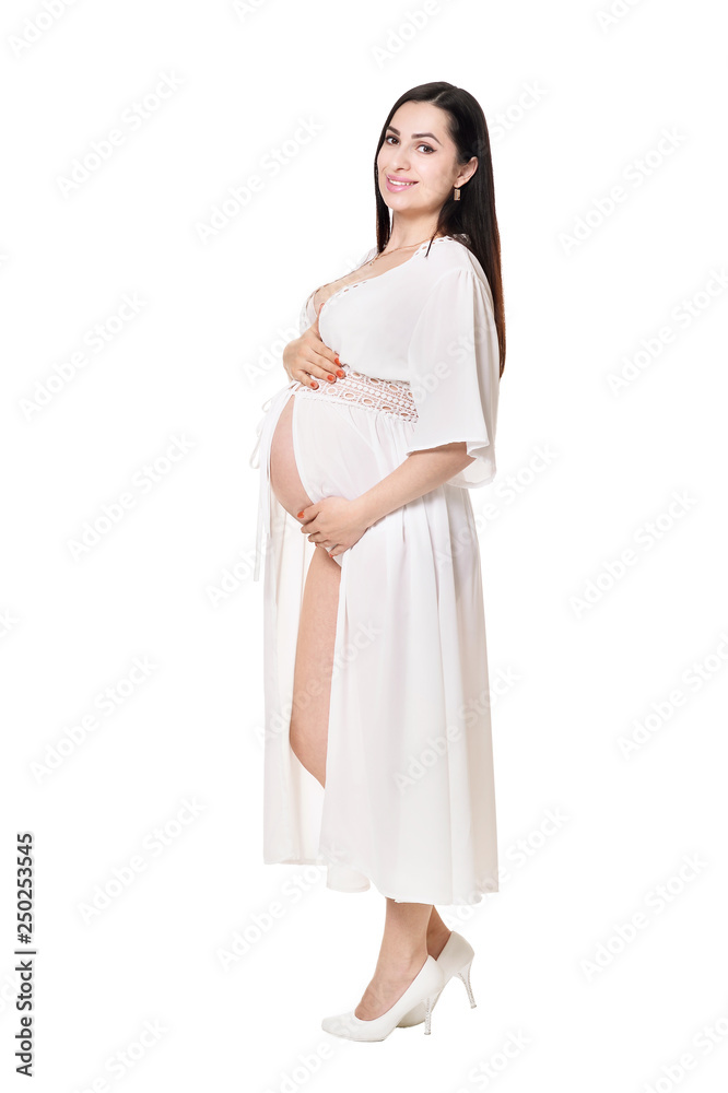 Young pregnant woman posing on white background Young pregnant woman posing on white background