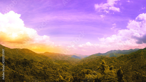 Travel and landscape in spring and summer concept from panorama view of tropical forest with layer of mountain and cloudy background