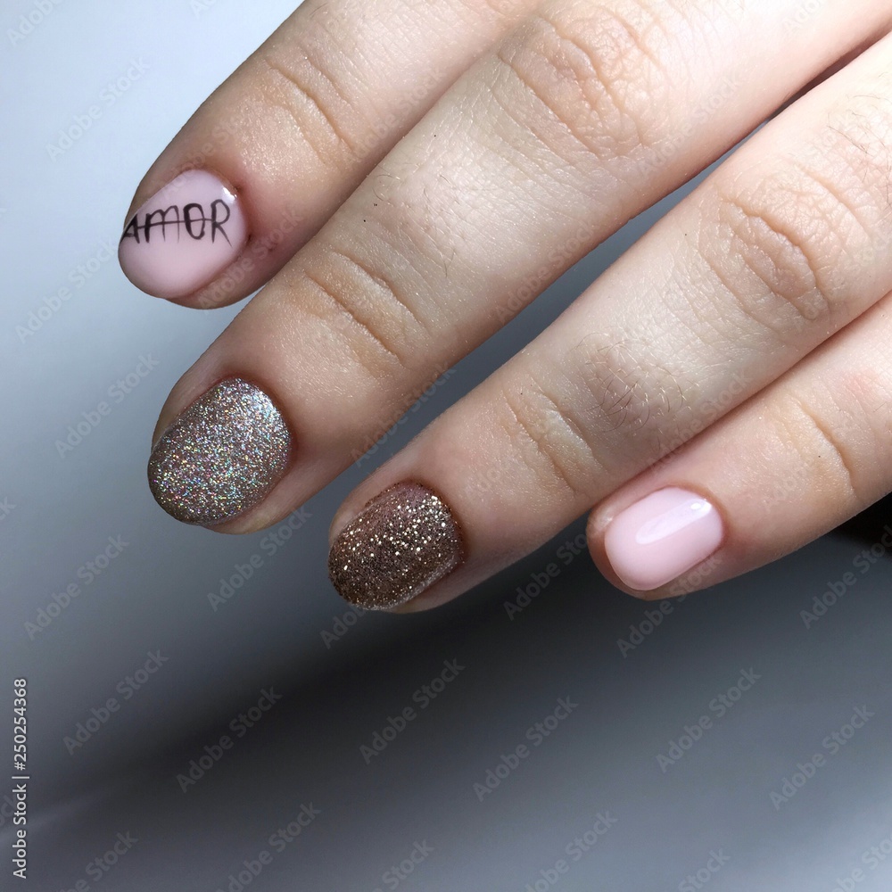 Manicure of different colors on nails. Female manicure Manicure of different colors on nails. Female manicure