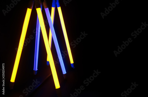 Colorful neon lamps on dark background