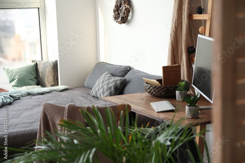 Interior of modern studio apartment © Pixel-Shot
