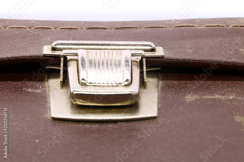 close up of old vintage suitcase lock closure