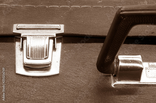 close up of old vintage suitcase lock closure