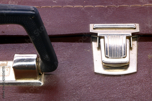 close up of old vintage suitcase lock closure