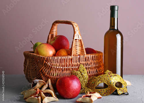 Gift basket for Purim holiday on table photo