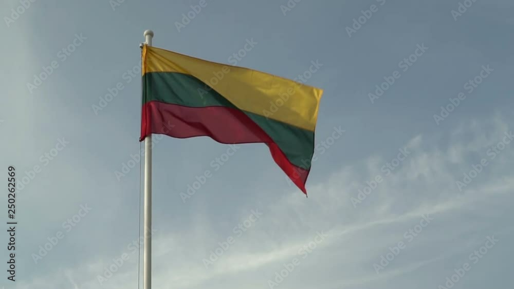Lithuanian flag waving on the blue sky background HD Lithuanian flag waving on the blue sky background HD