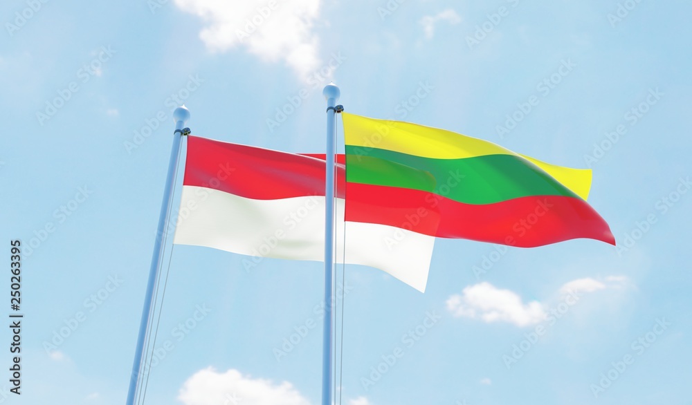 Lithuania and Indonesia, two flags waving against blue sky. 3d image Lithuania and Indonesia, two flags waving against blue sky. 3d image