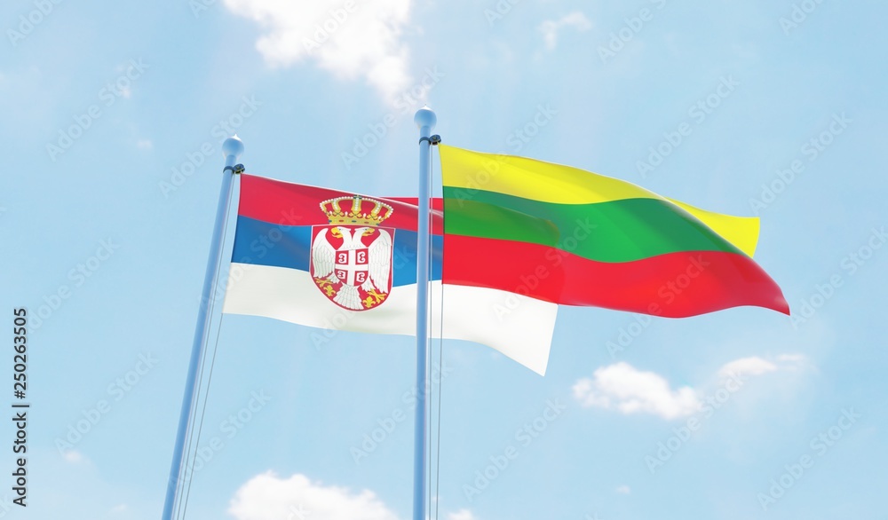 Lithuania and Serbia, two flags waving against blue sky. 3d image Lithuania and Serbia, two flags waving against blue sky. 3d image