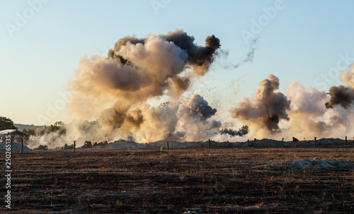 Explosions, fire and smoke, war