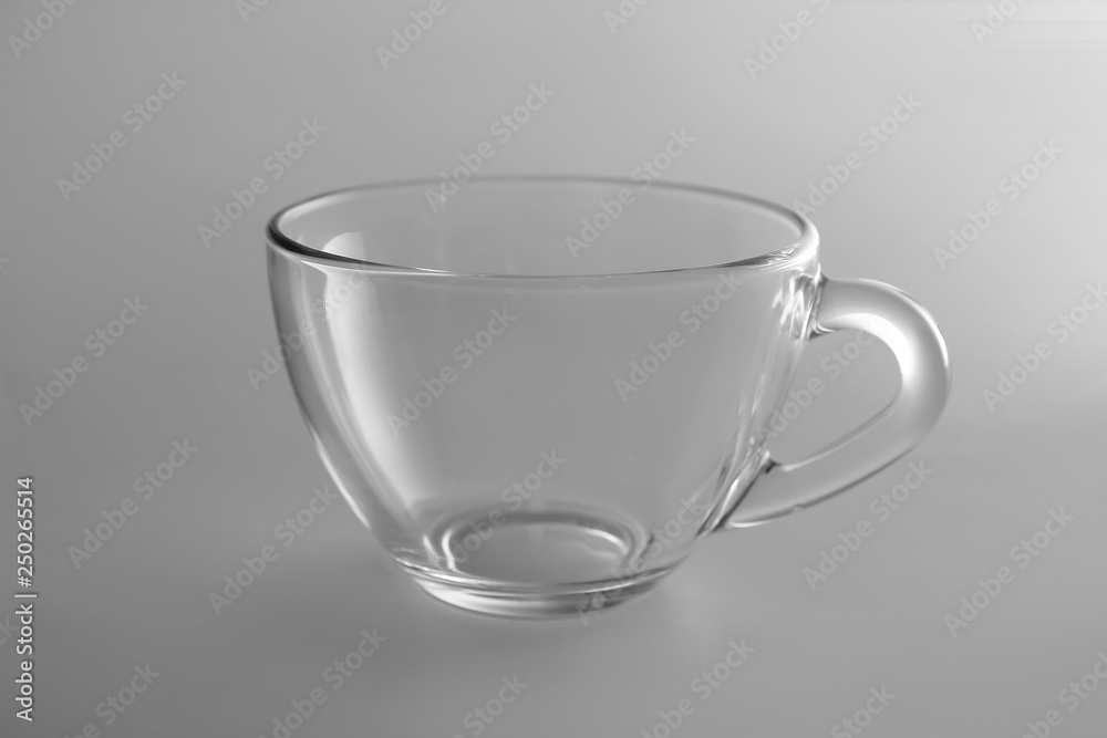 Empty glass cup on light background Empty glass cup on light background